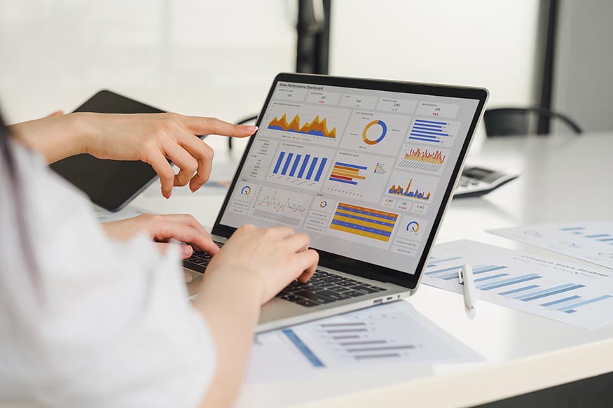 Two researchers analysing data.